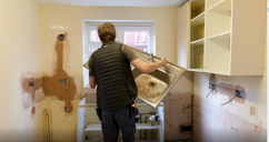 Contractors Removing A Sink