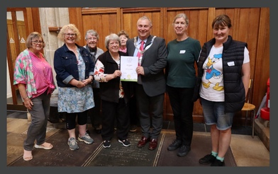 Melton in Bloom winnning Gold at East Midlands in Bloom being handed certificate by the current Mayor, Cllr Tim Webster