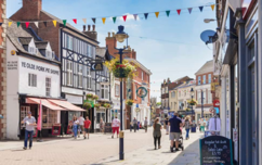 Town centre with pork pie shop and bell centre